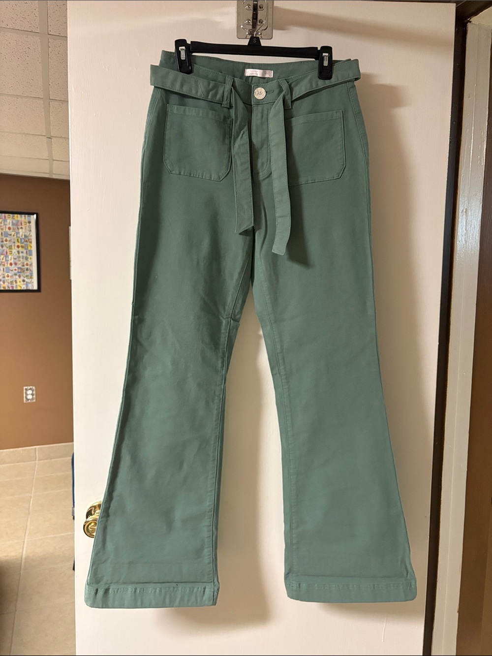 Lauren Conrad super high rise Flare jeans size 8 in sage green.